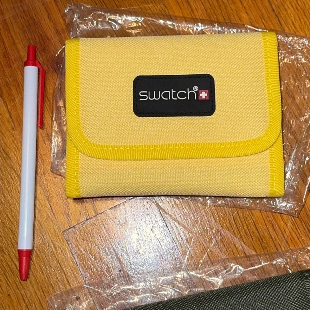 NWT Swatch brand wallet/billfold coin purse available in green or yellow unisex